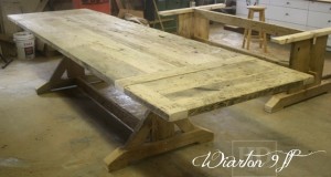 Details of job: 9 ft Sawbuck Table - 42" wide - Premium epoxy/matte polyurethane finish - Reclaimed Threshing Floor Hemlock - Two 18 inch end leaves - Two 42 inch benches