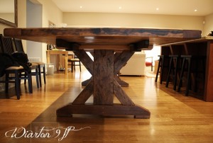 Details of job: 9 ft Sawbuck Table - 42" wide - Premium epoxy/matte polyurethane finish - Reclaimed Threshing Floor Hemlock - Two 18 inch end leaves - Two 42 inch benches